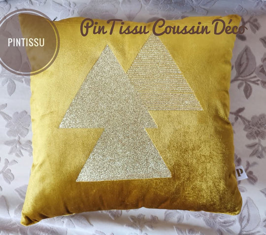 Coussin moutarde aux motifs dorés